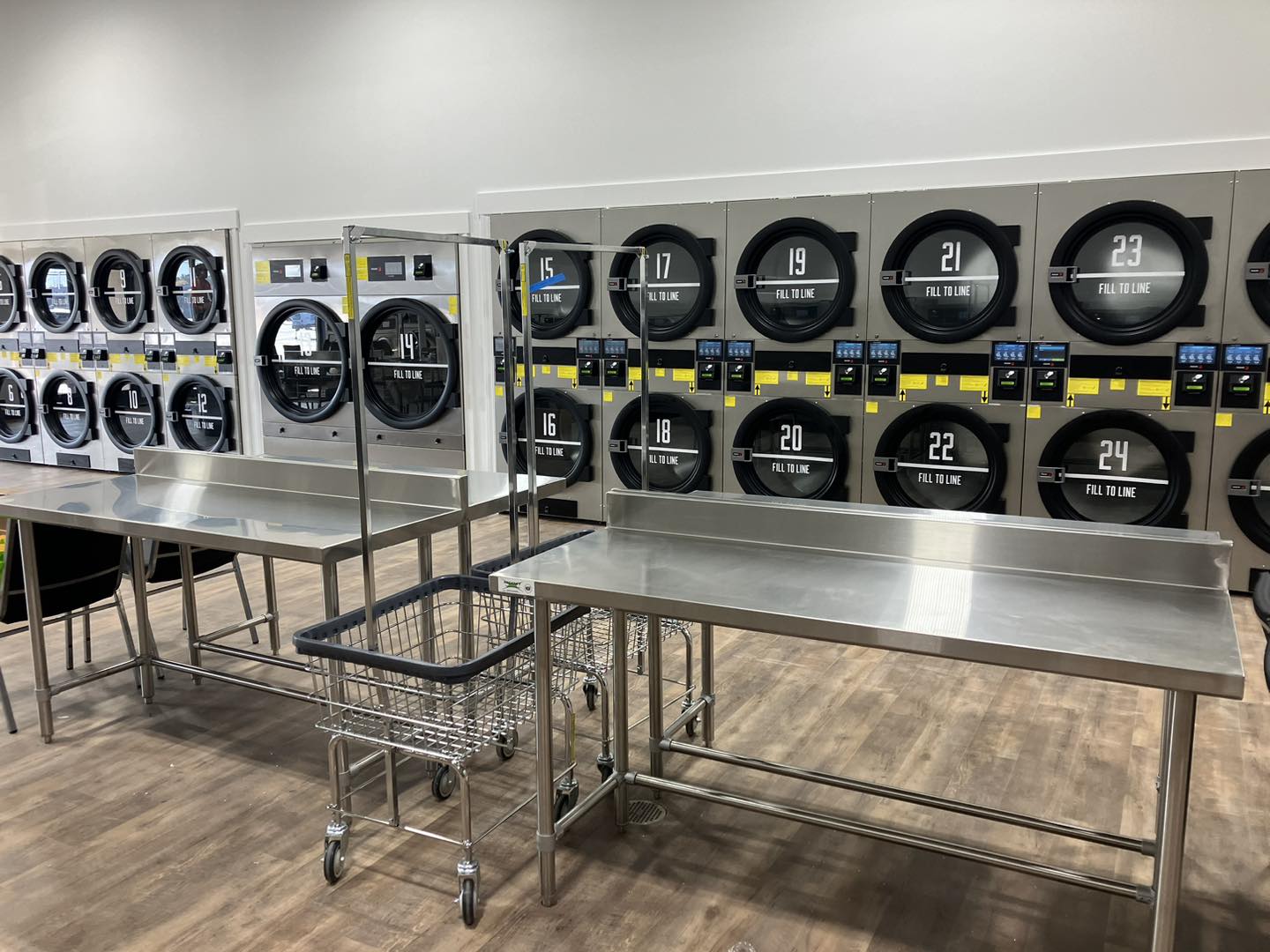 Clean, modern laundromat interior at The Washboard in Murray, KY