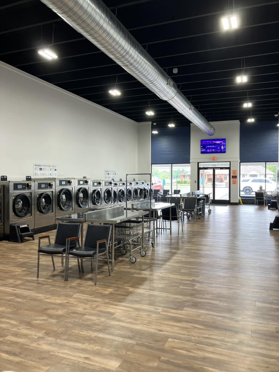 Inside The Washboard laundromat in Murray, KY — spacious seating and modern washers